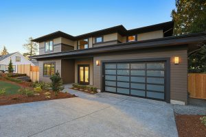 Modern house with large glass-paneled garage door